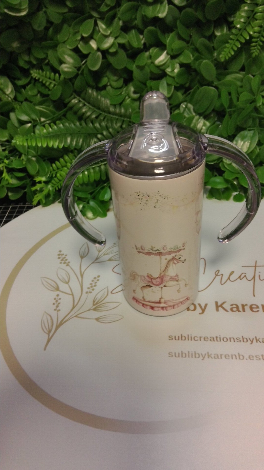 Merry-go-round toddler tumbler