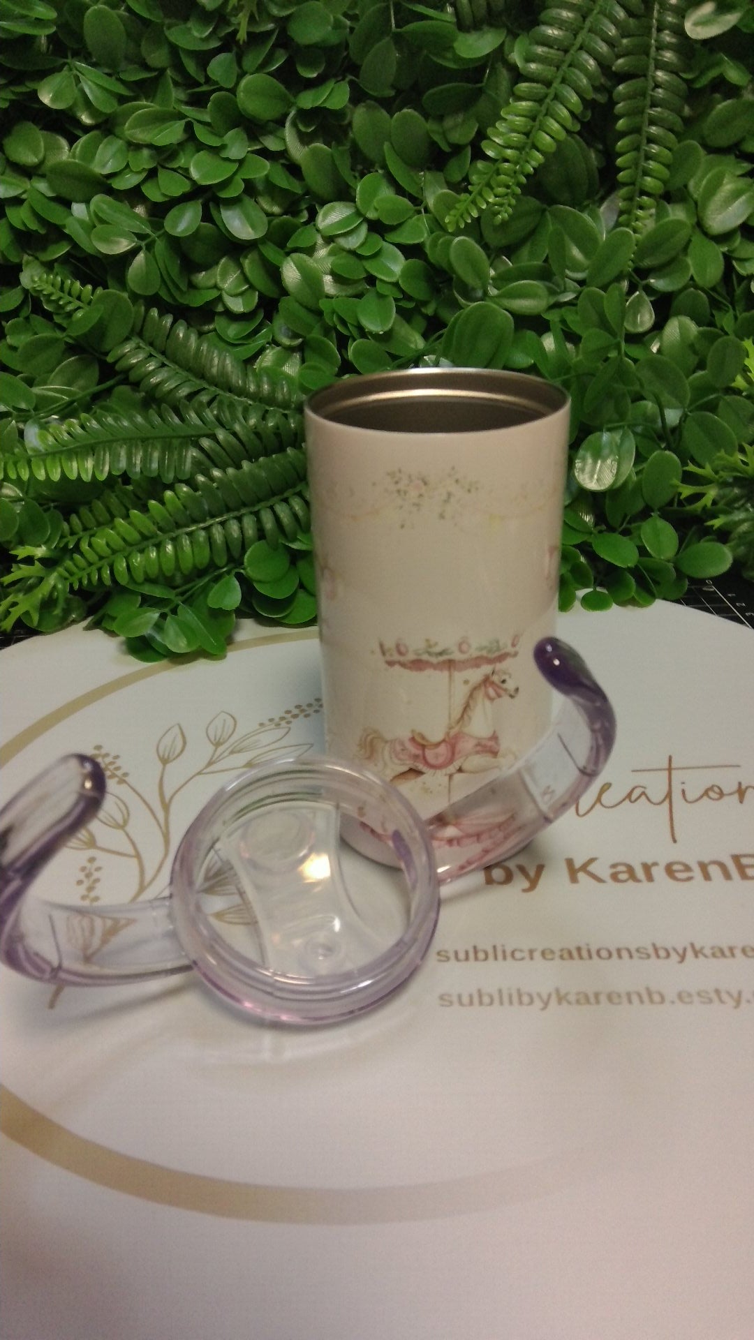 Merry-go-round toddler tumbler