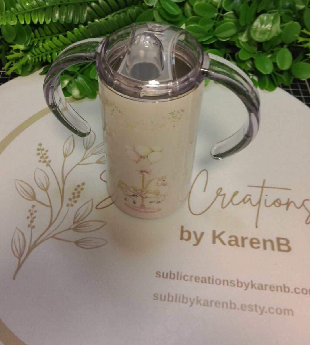 Merry-go-round toddler tumbler