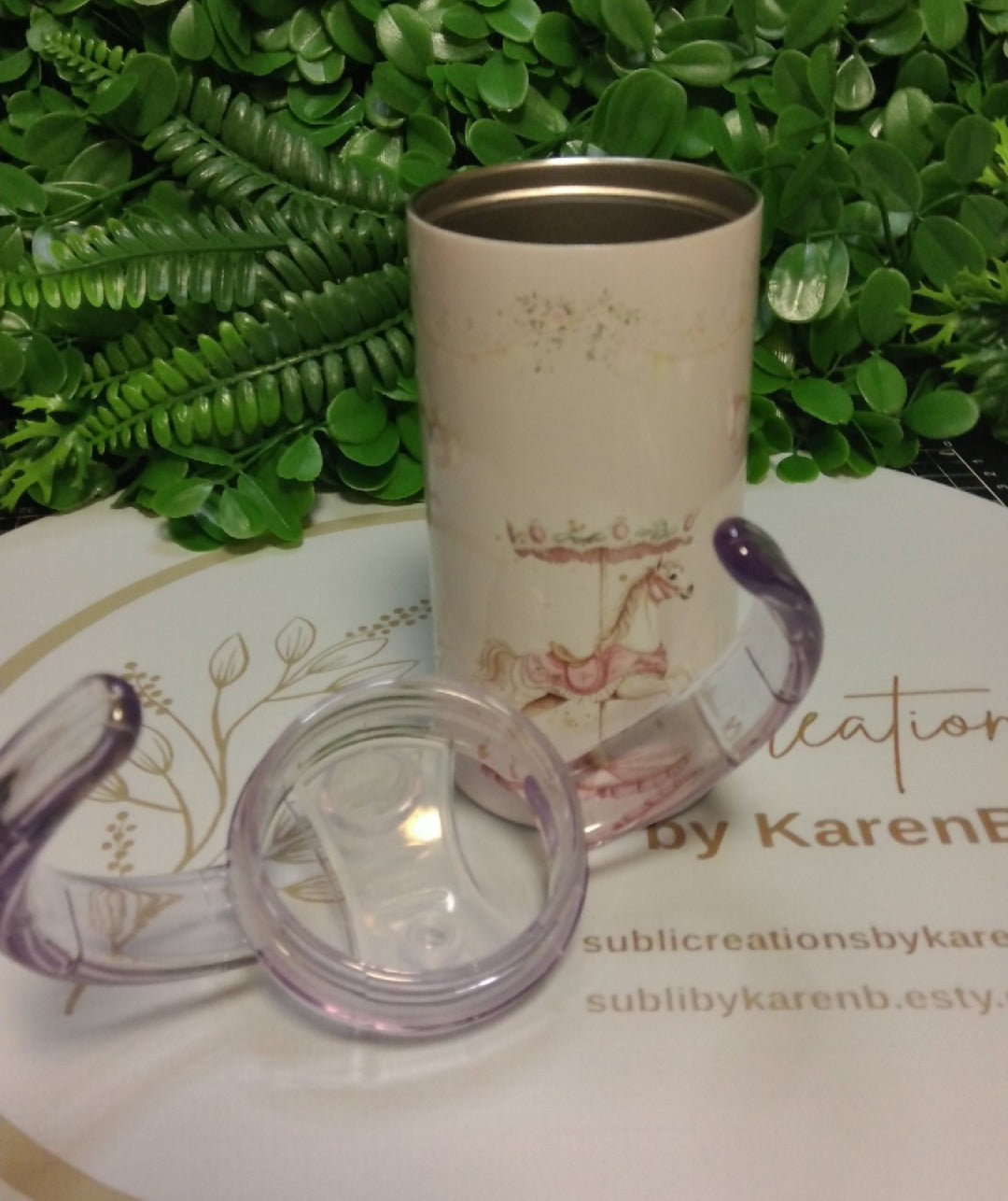 Merry-go-round toddler tumbler