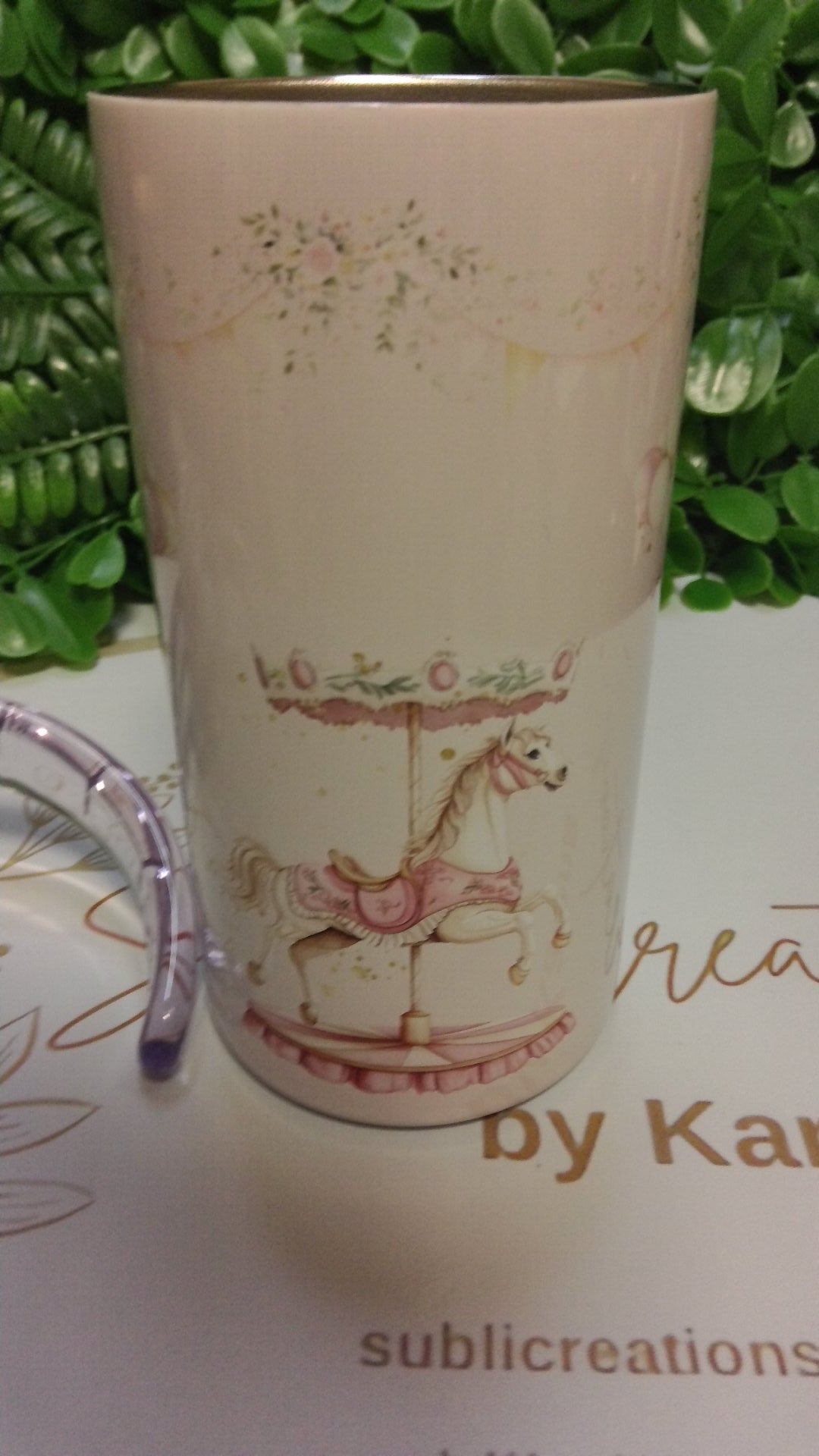 Merry-go-round toddler tumbler