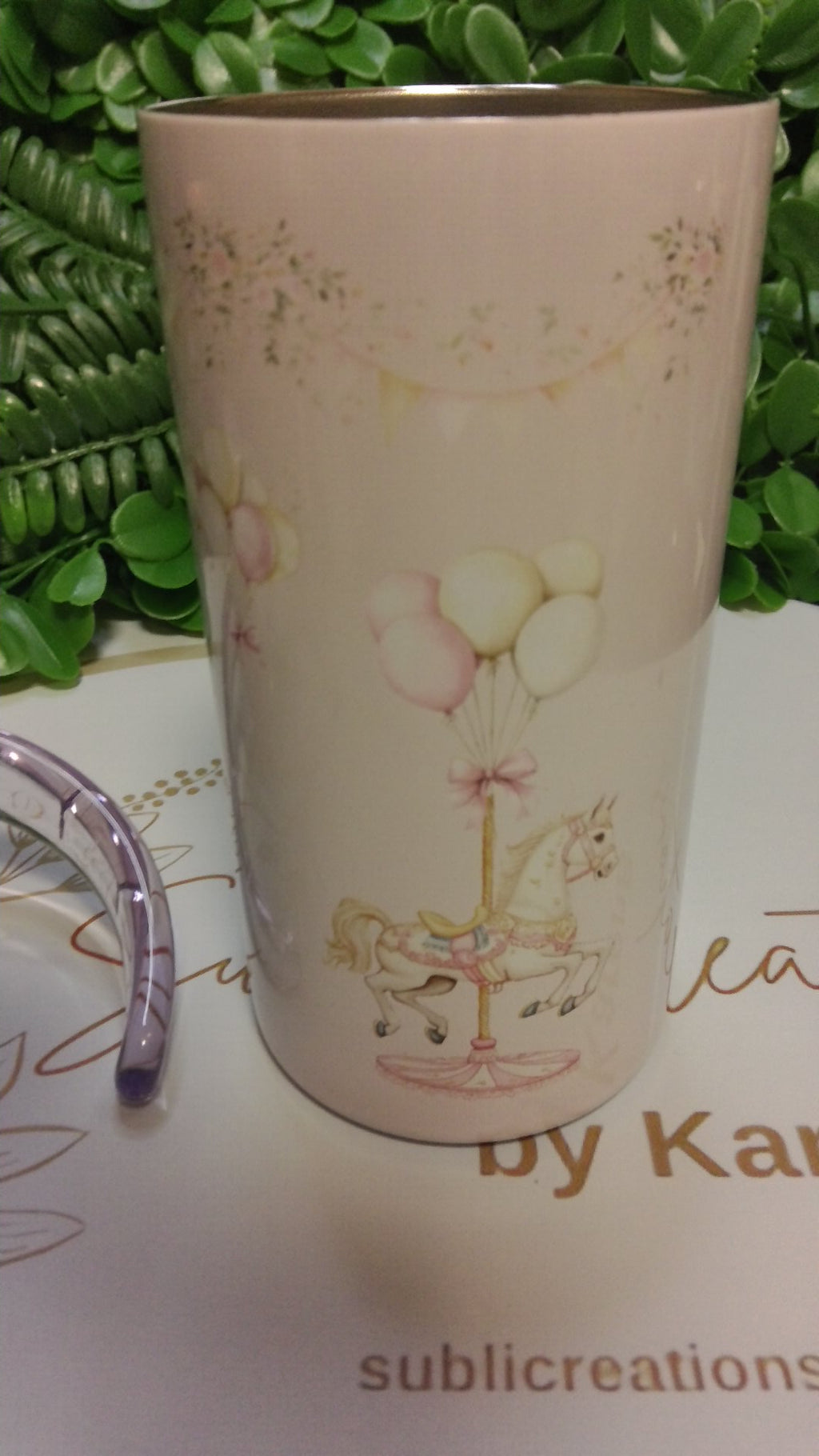 Merry-go-round toddler tumbler