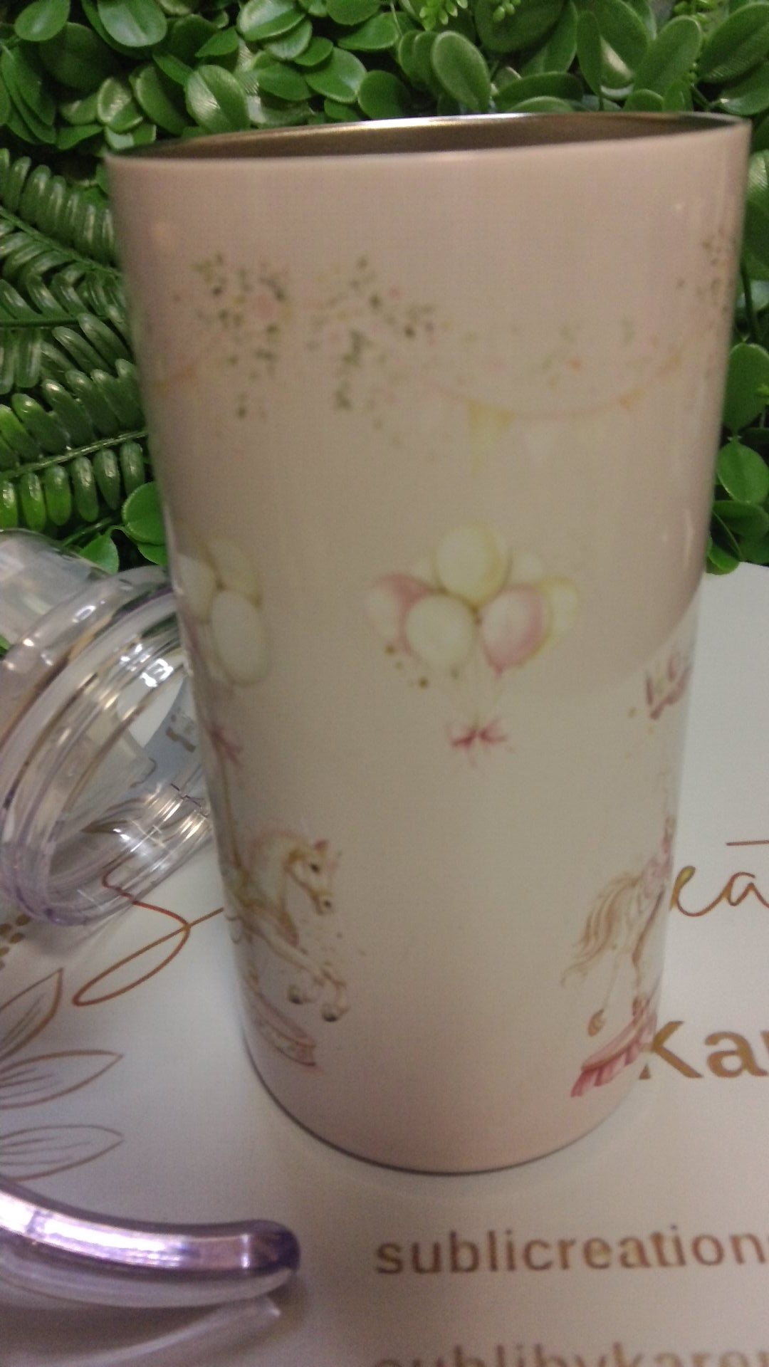 Merry-go-round toddler tumbler