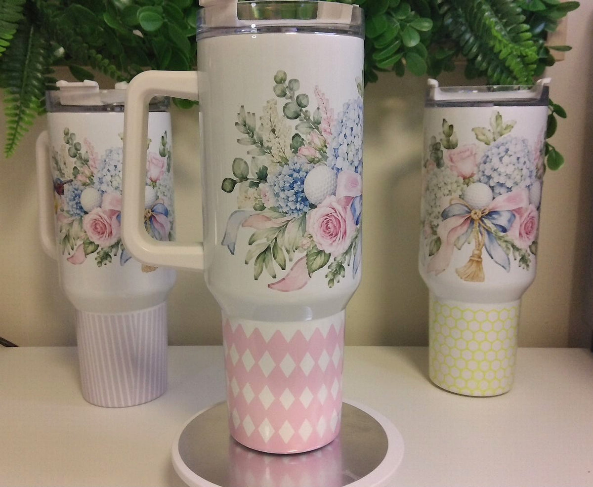 Tumbler with a floral golf motif