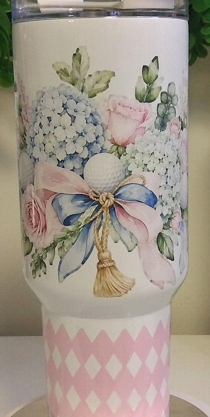 Tumbler with a floral golf motif