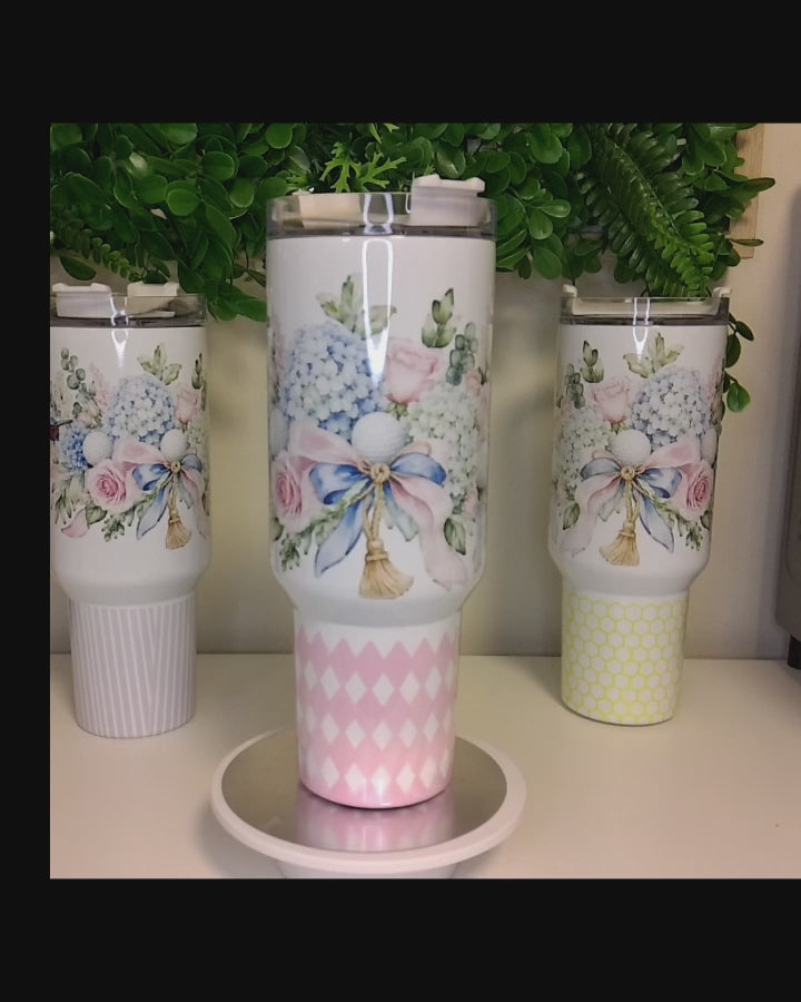 Tumbler with a floral golf motif